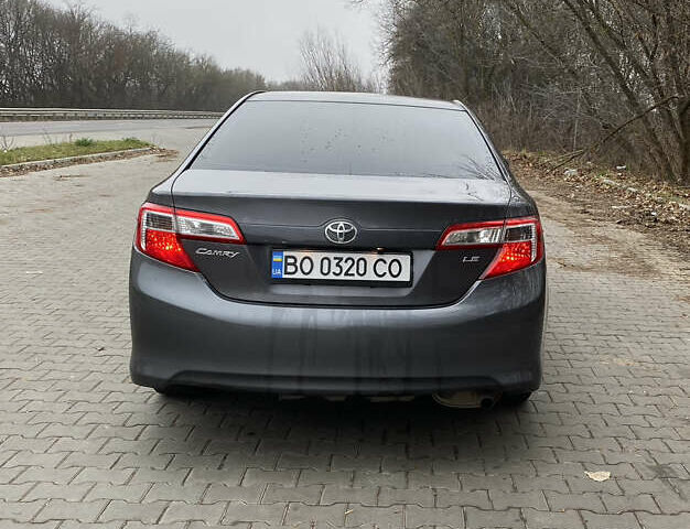 Сірий Тойота Камрі, об'ємом двигуна 2.4 л та пробігом 241 тис. км за 12600 $, фото 3 на Automoto.ua