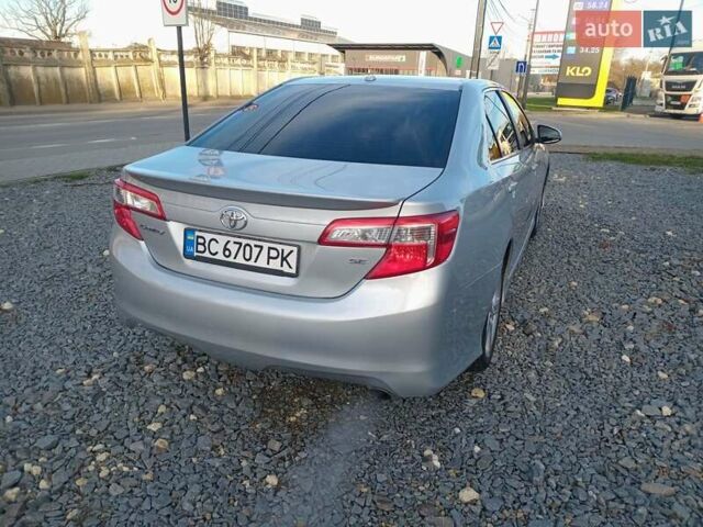 Серый Тойота Камри, объемом двигателя 2.49 л и пробегом 230 тыс. км за 9800 $, фото 5 на Automoto.ua