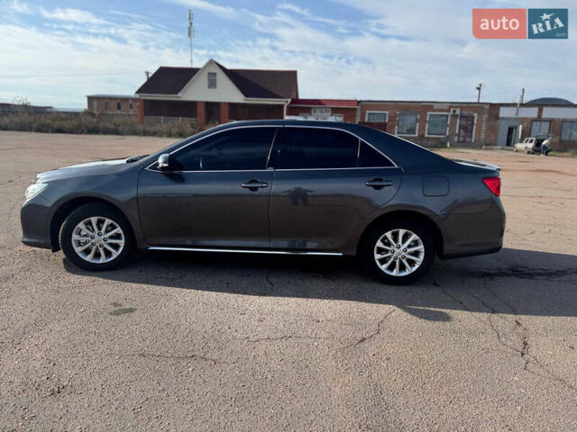 Сірий Тойота Камрі, об'ємом двигуна 2.5 л та пробігом 240 тис. км за 12999 $, фото 10 на Automoto.ua