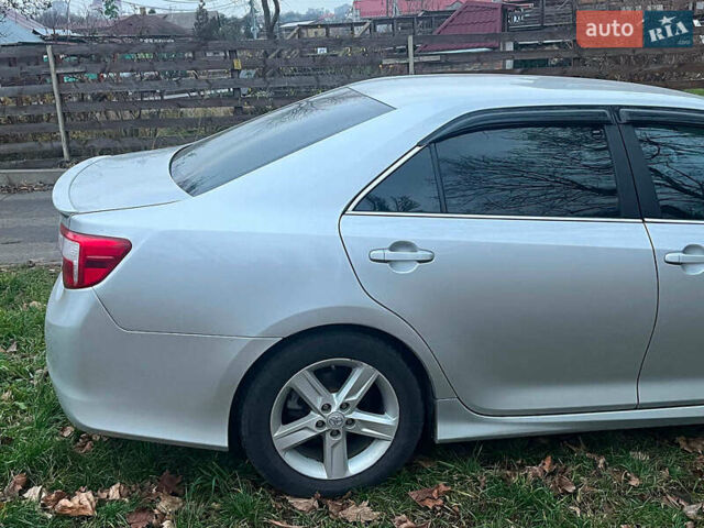 Сірий Тойота Камрі, об'ємом двигуна 2.5 л та пробігом 297 тис. км за 10390 $, фото 12 на Automoto.ua