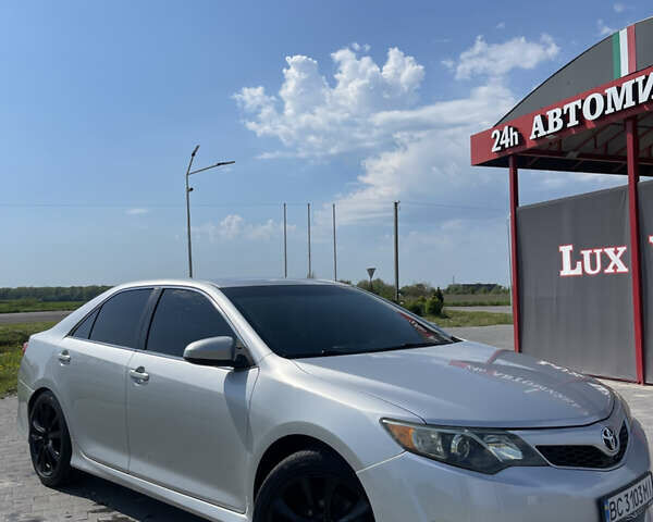 Серый Тойота Камри, объемом двигателя 2.5 л и пробегом 255 тыс. км за 11999 $, фото 1 на Automoto.ua