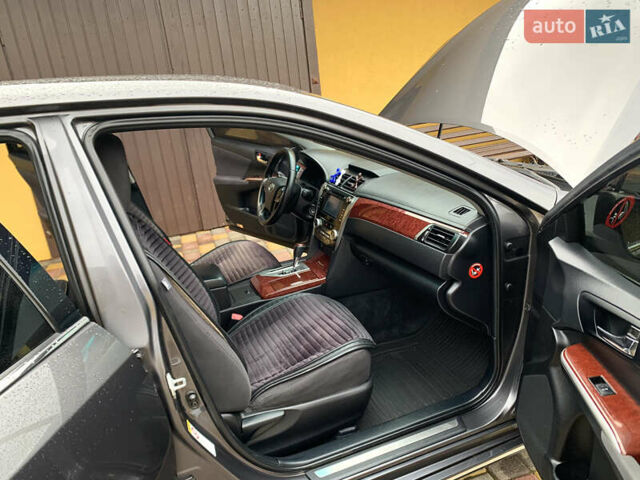 Сірий Тойота Камрі, об'ємом двигуна 2.49 л та пробігом 225 тис. км за 12800 $, фото 30 на Automoto.ua