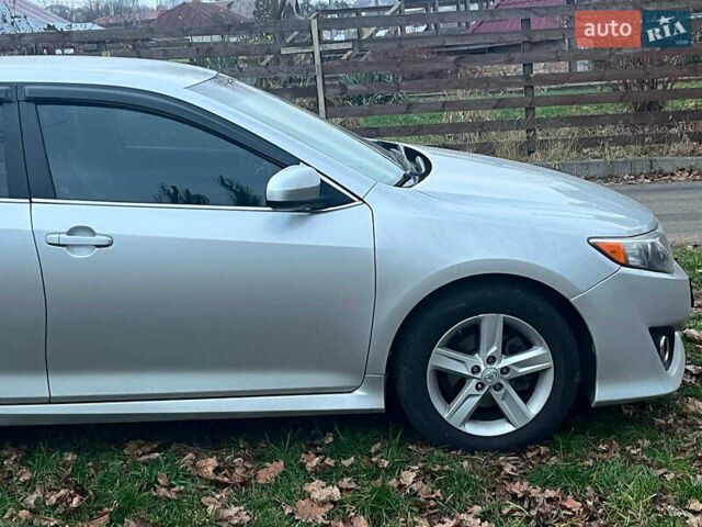 Сірий Тойота Камрі, об'ємом двигуна 2.5 л та пробігом 297 тис. км за 10390 $, фото 13 на Automoto.ua