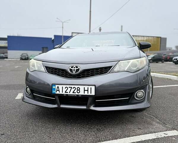 Сірий Тойота Камрі, об'ємом двигуна 2.49 л та пробігом 230 тис. км за 11000 $, фото 4 на Automoto.ua