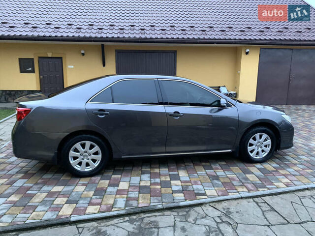 Сірий Тойота Камрі, об'ємом двигуна 2.49 л та пробігом 225 тис. км за 12800 $, фото 25 на Automoto.ua