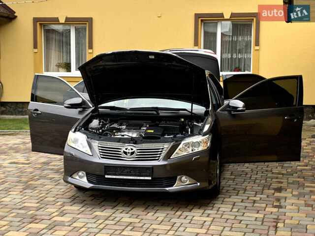 Сірий Тойота Камрі, об'ємом двигуна 2.49 л та пробігом 225 тис. км за 12800 $, фото 35 на Automoto.ua