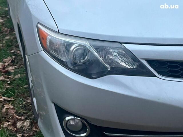 Серый Тойота Камри, объемом двигателя 2.5 л и пробегом 297 тыс. км за 10390 $, фото 3 на Automoto.ua