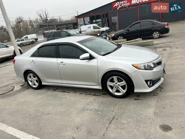 Серый Тойота Камри, объемом двигателя 2.5 л и пробегом 297 тыс. км за 10300 $, фото 5 на Automoto.ua