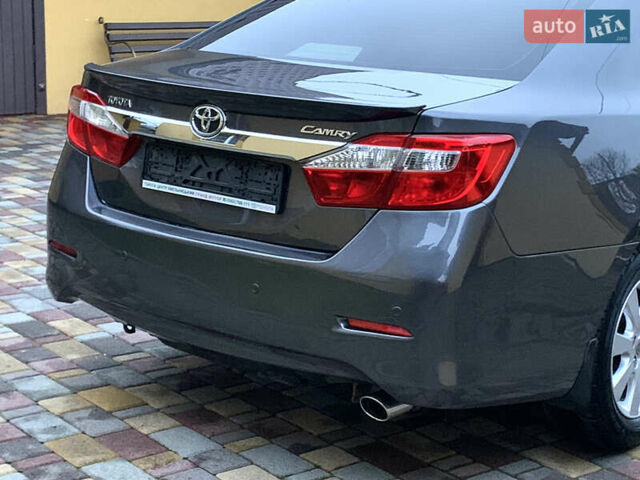 Сірий Тойота Камрі, об'ємом двигуна 2.49 л та пробігом 225 тис. км за 12800 $, фото 24 на Automoto.ua
