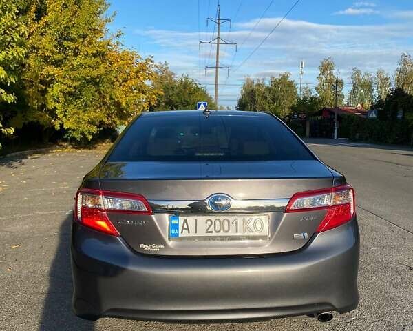 Сірий Тойота Камрі, об'ємом двигуна 2.49 л та пробігом 135 тис. км за 14900 $, фото 3 на Automoto.ua