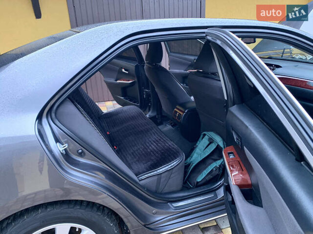 Сірий Тойота Камрі, об'ємом двигуна 2.49 л та пробігом 225 тис. км за 12800 $, фото 29 на Automoto.ua