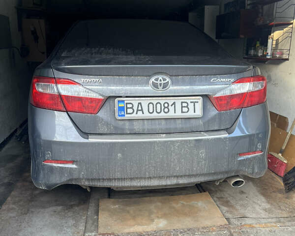 Сірий Тойота Камрі, об'ємом двигуна 2.49 л та пробігом 198 тис. км за 14700 $, фото 1 на Automoto.ua