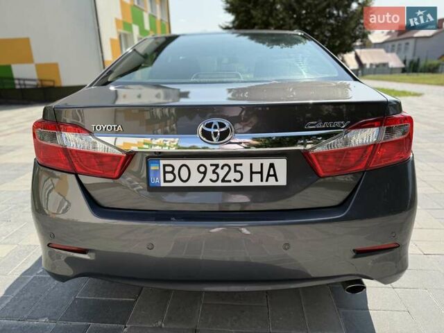 Сірий Тойота Камрі, об'ємом двигуна 2.49 л та пробігом 284 тис. км за 12500 $, фото 66 на Automoto.ua