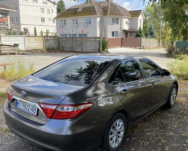 Серый Тойота Камри, объемом двигателя 2.49 л и пробегом 165 тыс. км за 12800 $, фото 16 на Automoto.ua
