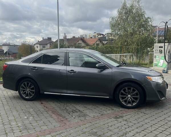 Сірий Тойота Камрі, об'ємом двигуна 2.49 л та пробігом 224 тис. км за 11900 $, фото 4 на Automoto.ua