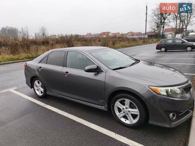 Серый Тойота Камри, объемом двигателя 2.5 л и пробегом 172 тыс. км за 11500 $, фото 1 на Automoto.ua