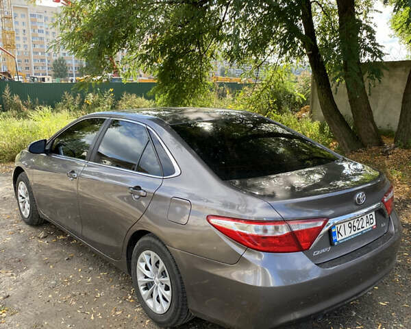 Серый Тойота Камри, объемом двигателя 2.49 л и пробегом 165 тыс. км за 12800 $, фото 14 на Automoto.ua