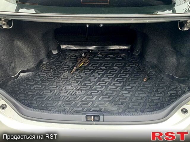 Сірий Тойота Камрі, об'ємом двигуна 2.5 л та пробігом 282 тис. км за 11420 $, фото 12 на Automoto.ua