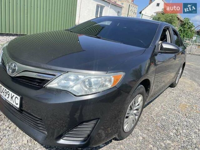 Серый Тойота Камри, объемом двигателя 2.49 л и пробегом 100 тыс. км за 11499 $, фото 11 на Automoto.ua