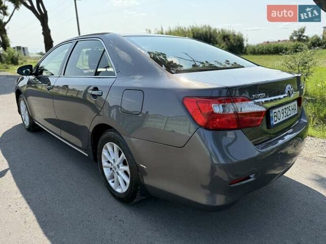 Серый Тойота Камри, объемом двигателя 2.49 л и пробегом 285 тыс. км за 12500 $, фото 23 на Automoto.ua