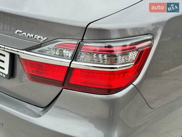Серый Тойота Камри, объемом двигателя 2.49 л и пробегом 114 тыс. км за 17700 $, фото 3 на Automoto.ua