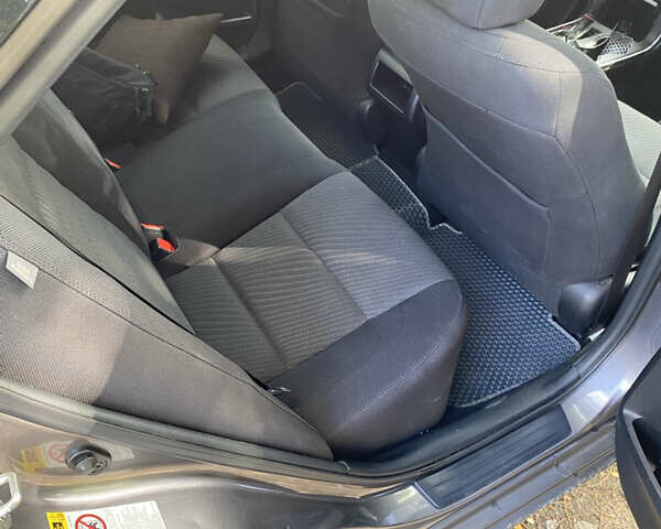 Серый Тойота Камри, объемом двигателя 2.49 л и пробегом 165 тыс. км за 12800 $, фото 9 на Automoto.ua