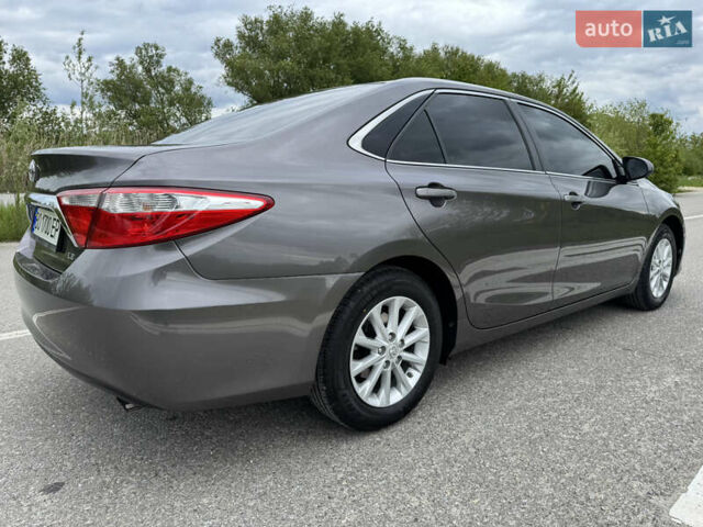Сірий Тойота Камрі, об'ємом двигуна 2.49 л та пробігом 210 тис. км за 14950 $, фото 3 на Automoto.ua