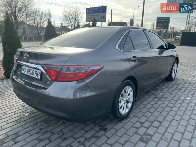 Сірий Тойота Камрі, об'ємом двигуна 2.49 л та пробігом 175 тис. км за 12000 $, фото 4 на Automoto.ua
