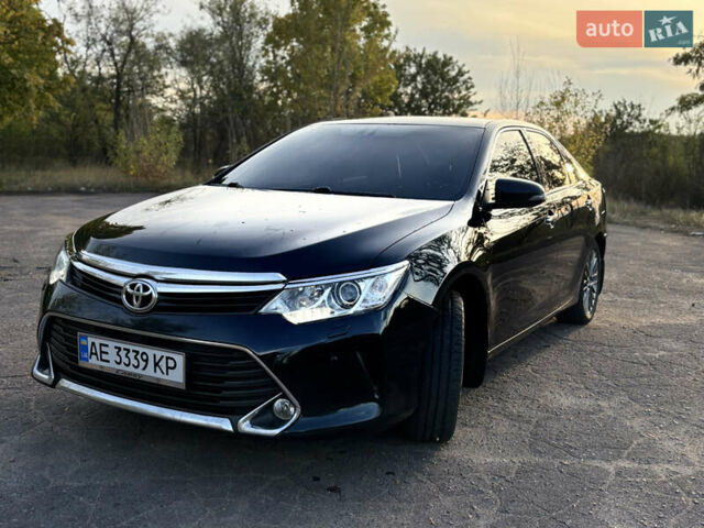 Серый Тойота Камри, объемом двигателя 2.49 л и пробегом 200 тыс. км за 18500 $, фото 1 на Automoto.ua