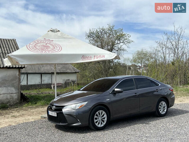 Сірий Тойота Камрі, об'ємом двигуна 2.49 л та пробігом 175 тис. км за 12000 $, фото 10 на Automoto.ua