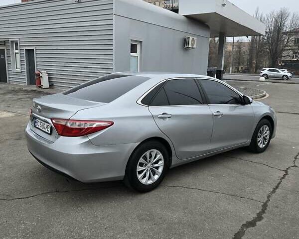 Серый Тойота Камри, объемом двигателя 2.5 л и пробегом 211 тыс. км за 12600 $, фото 4 на Automoto.ua