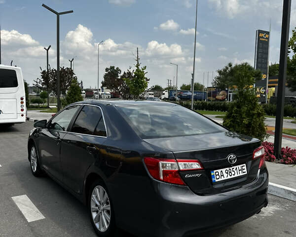 Серый Тойота Камри, объемом двигателя 2.49 л и пробегом 138 тыс. км за 11700 $, фото 7 на Automoto.ua