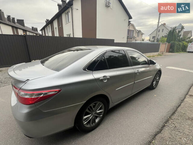 Серый Тойота Камри, объемом двигателя 2.49 л и пробегом 251 тыс. км за 10600 $, фото 4 на Automoto.ua