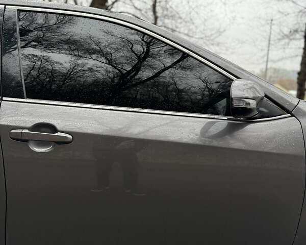 Серый Тойота Камри, объемом двигателя 2.49 л и пробегом 210 тыс. км за 14650 $, фото 6 на Automoto.ua