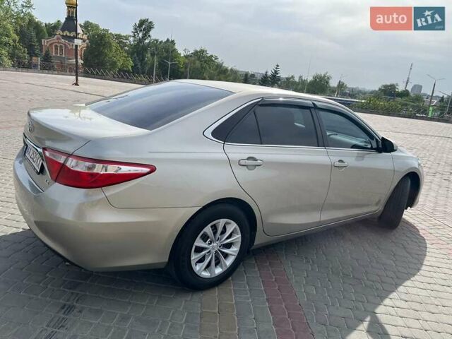 Сірий Тойота Камрі, об'ємом двигуна 2.49 л та пробігом 123 тис. км за 15500 $, фото 3 на Automoto.ua