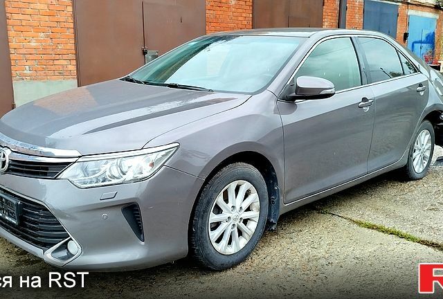 Серый Тойота Камри, объемом двигателя 2.5 л и пробегом 134 тыс. км за 10000 $, фото 1 на Automoto.ua