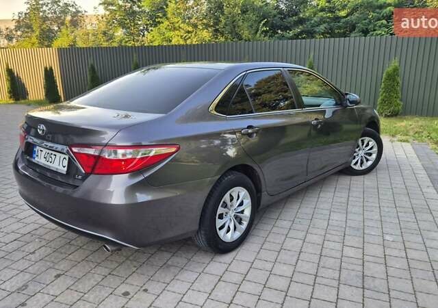 Сірий Тойота Камрі, об'ємом двигуна 2.49 л та пробігом 225 тис. км за 16550 $, фото 4 на Automoto.ua