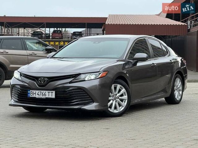 Серый Тойота Камри, объемом двигателя 2.49 л и пробегом 119 тыс. км за 17800 $, фото 1 на Automoto.ua