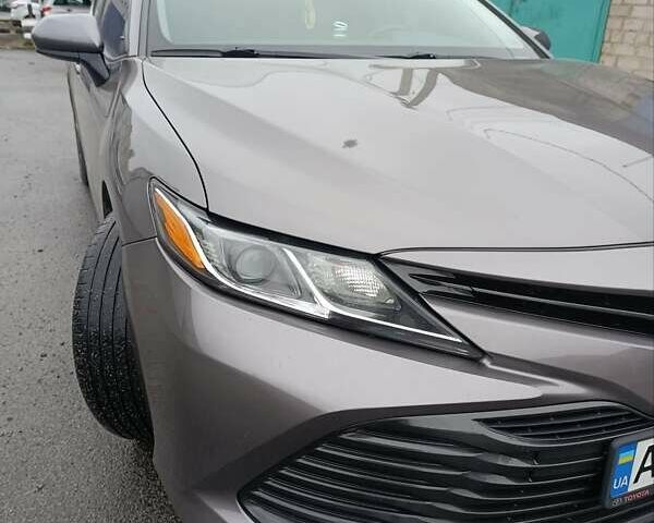 Серый Тойота Камри, объемом двигателя 2.49 л и пробегом 140 тыс. км за 18200 $, фото 5 на Automoto.ua