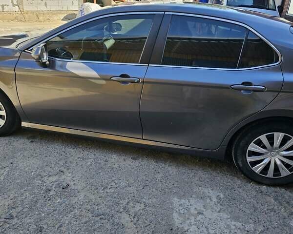 Серый Тойота Камри, объемом двигателя 2.49 л и пробегом 62 тыс. км за 18000 $, фото 5 на Automoto.ua