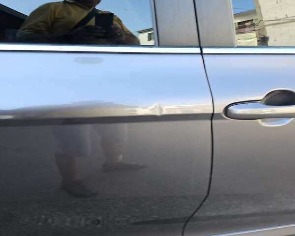 Серый Тойота Камри, объемом двигателя 2.49 л и пробегом 62 тыс. км за 18000 $, фото 12 на Automoto.ua