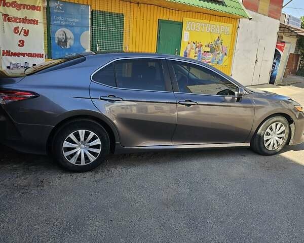 Серый Тойота Камри, объемом двигателя 2.49 л и пробегом 62 тыс. км за 18000 $, фото 4 на Automoto.ua