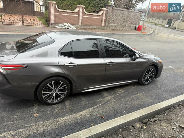 Серый Тойота Камри, объемом двигателя 2.49 л и пробегом 95 тыс. км за 23000 $, фото 7 на Automoto.ua