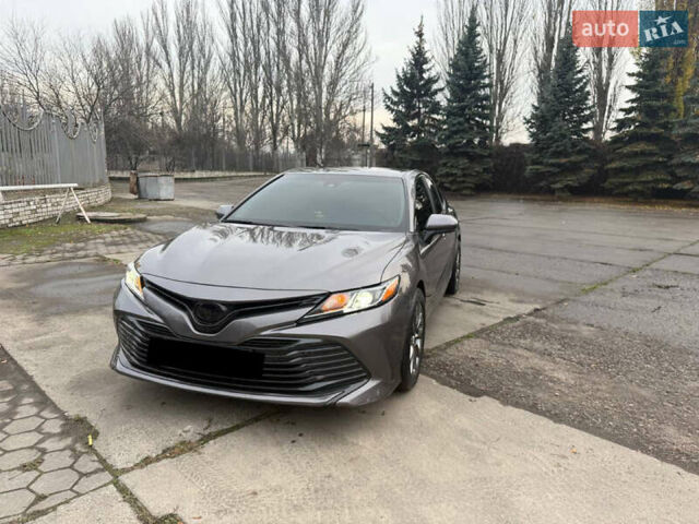 Серый Тойота Камри, объемом двигателя 2.49 л и пробегом 134 тыс. км за 17300 $, фото 1 на Automoto.ua