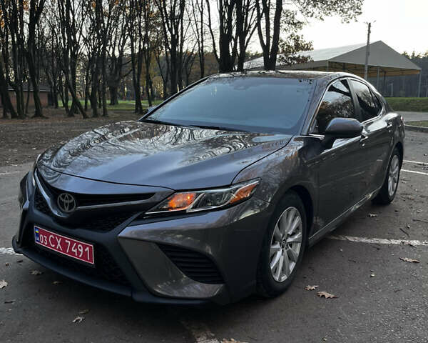 Серый Тойота Камри, объемом двигателя 2.49 л и пробегом 104 тыс. км за 19200 $, фото 1 на Automoto.ua