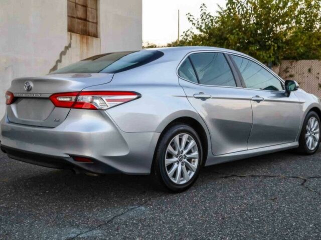 Сірий Тойота Камрі, об'ємом двигуна 2.5 л та пробігом 49 тис. км за 14000 $, фото 4 на Automoto.ua