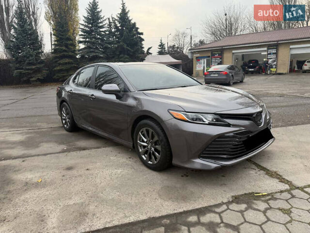 Серый Тойота Камри, объемом двигателя 2.49 л и пробегом 134 тыс. км за 17300 $, фото 2 на Automoto.ua