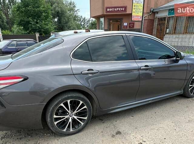 Сірий Тойота Камрі, об'ємом двигуна 2.49 л та пробігом 80 тис. км за 21114 $, фото 2 на Automoto.ua
