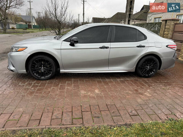 Сірий Тойота Камрі, об'ємом двигуна 2.49 л та пробігом 177 тис. км за 21500 $, фото 1 на Automoto.ua