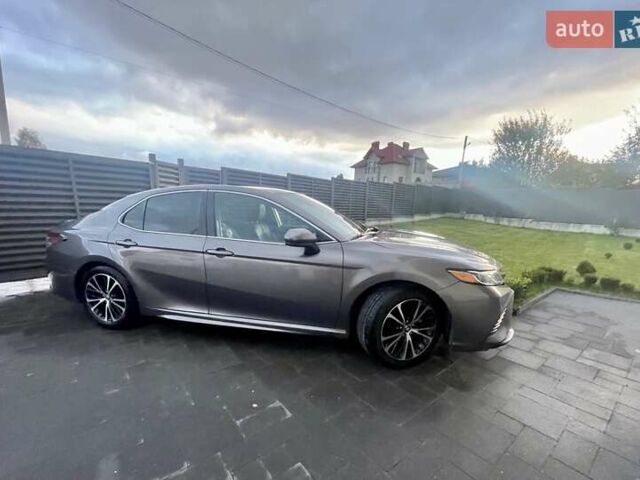 Серый Тойота Камри, объемом двигателя 2.49 л и пробегом 97 тыс. км за 22399 $, фото 1 на Automoto.ua